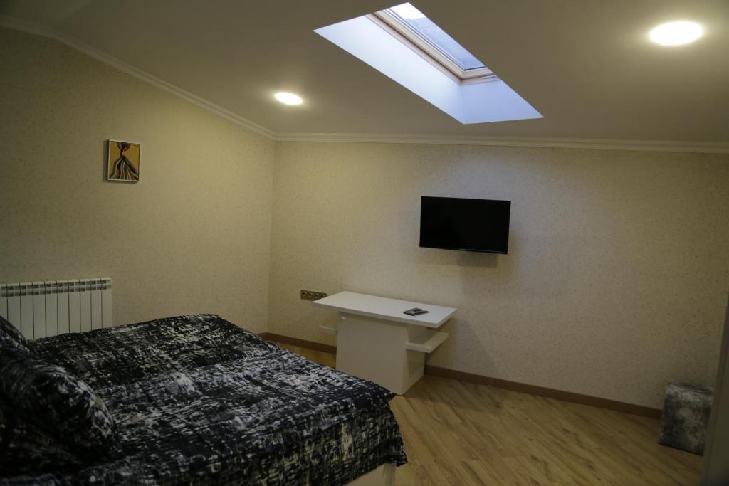 Postel nebo postele na pokoji v ubytování Hotel 12 Tve