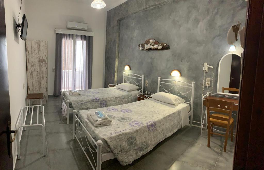 Postel nebo postele na pokoji v ubytování Villa Ilios