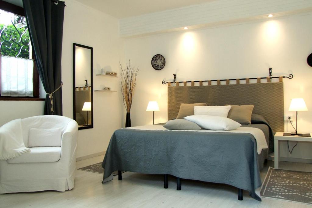 Postel nebo postele na pokoji v ubytování Monolocali In Casa Con Giardino Bellagio