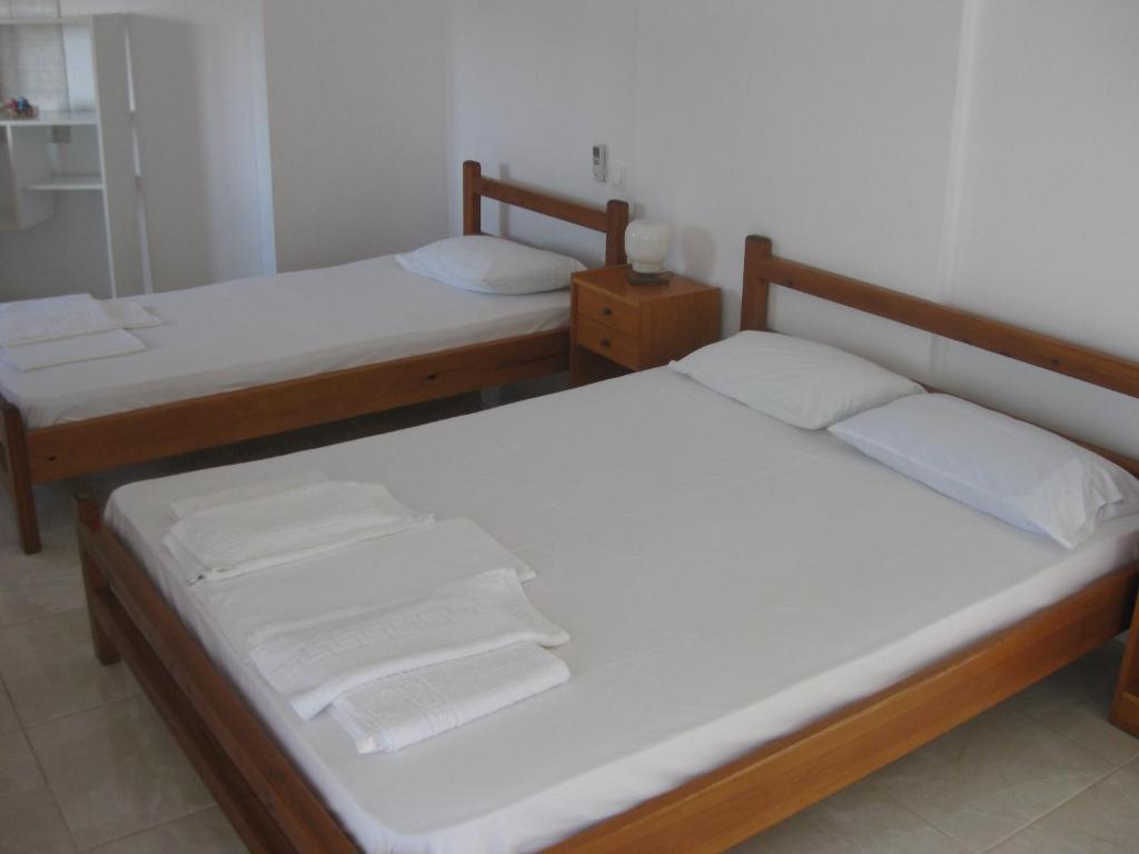 A bed or beds in a room at Maravelias House