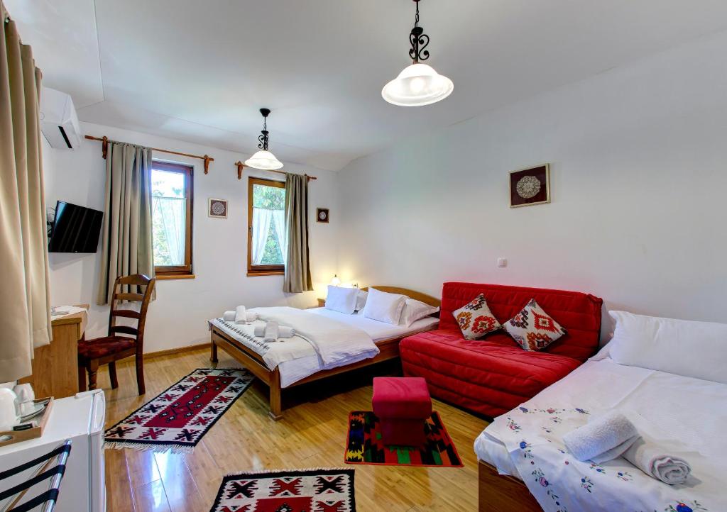 Postel nebo postele na pokoji v ubytování Hotel Almira