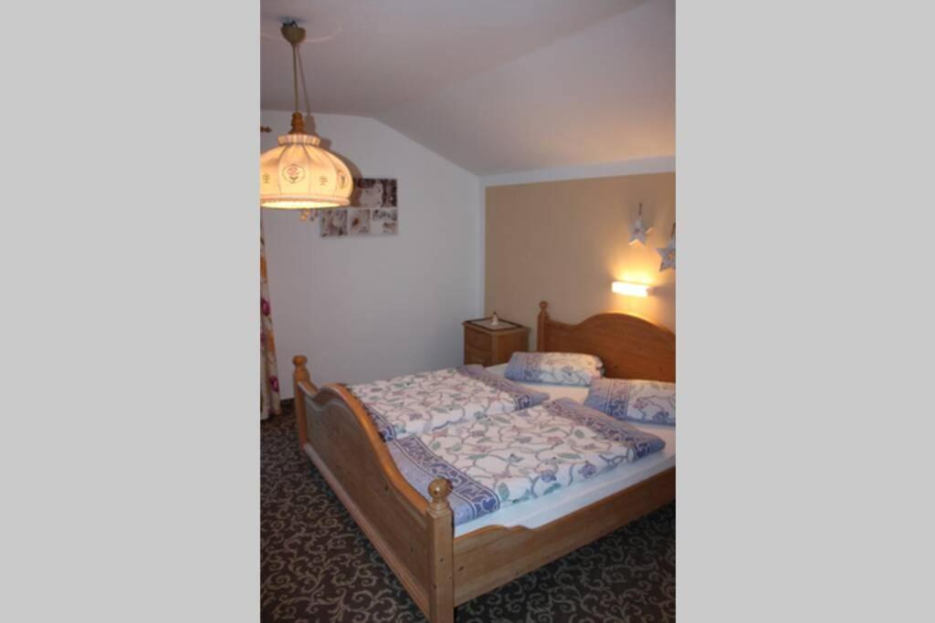 A bed or beds in a room at Haus Keil