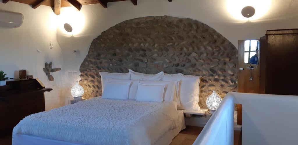Postel nebo postele na pokoji v ubytování La Torre Medioevale