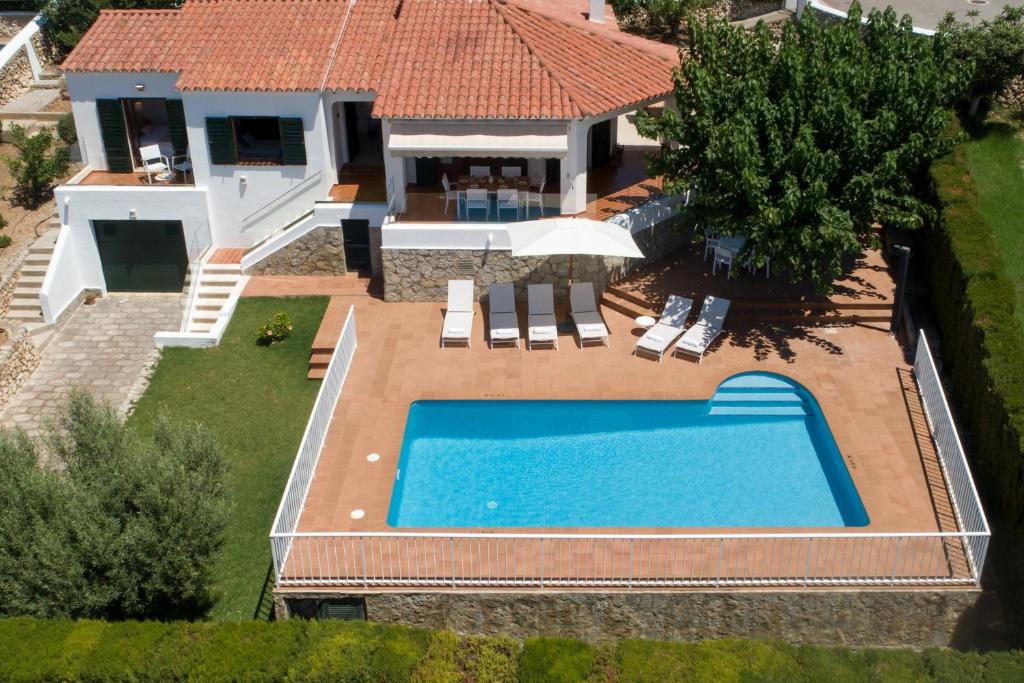 an aerial view of a house with a swimming pool at Villa Anna 12B in Son Bou