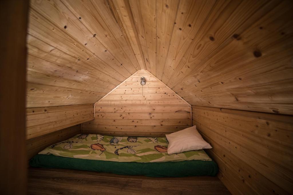 Posteľ alebo postele v izbe v ubytovaní Apartamenty na Kasztelańskiej