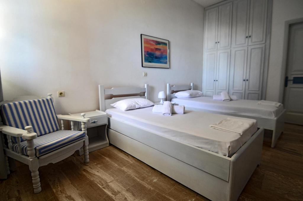 Postel nebo postele na pokoji v ubytování Soulis Hotel