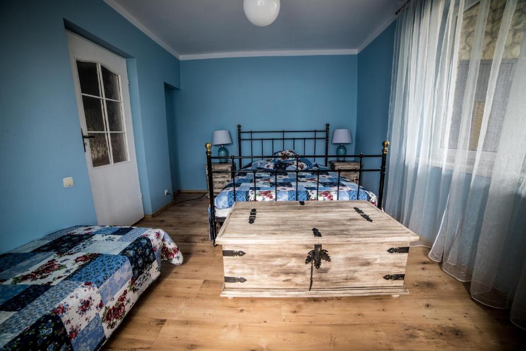 Posteľ alebo postele v izbe v ubytovaní Apartamenty na Kasztelańskiej
