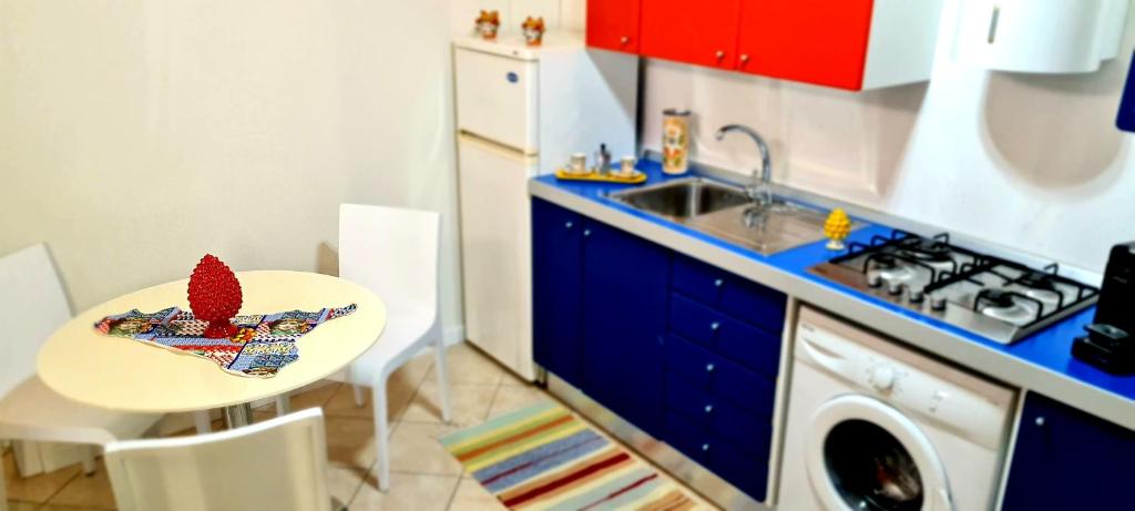 Kuchyň nebo kuchyňský kout v ubytování Vacanze Cassibile