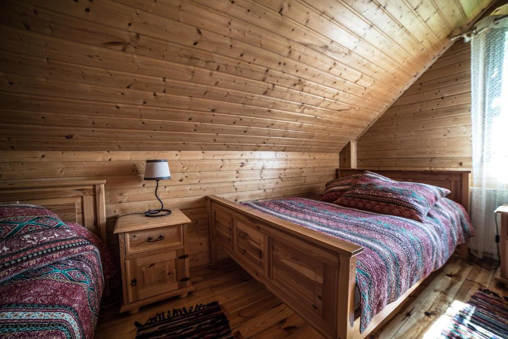 Posteľ alebo postele v izbe v ubytovaní Apartamenty na Kasztelańskiej