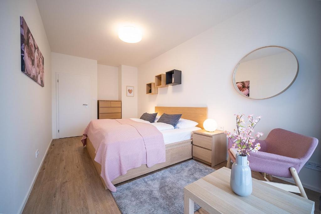 Łóżko lub łóżka w pokoju w obiekcie Apartmán Lipnoport