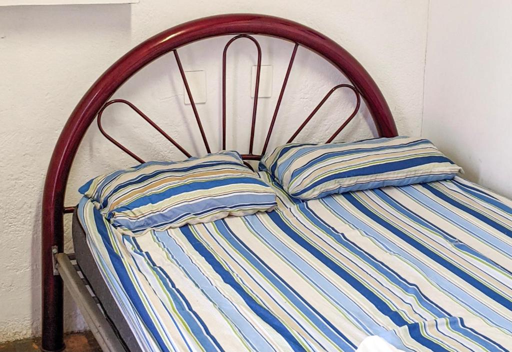 Postel nebo postele na pokoji v ubytování Chanclas Hostel Vallarta