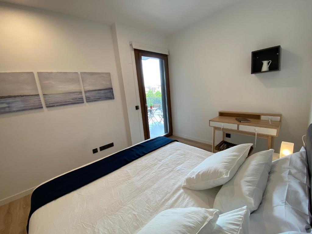 Postel nebo postele na pokoji v ubytování Vianetto Home