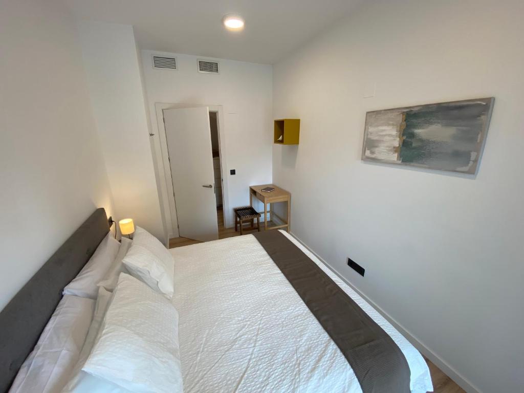 Postel nebo postele na pokoji v ubytování Vianetto Home