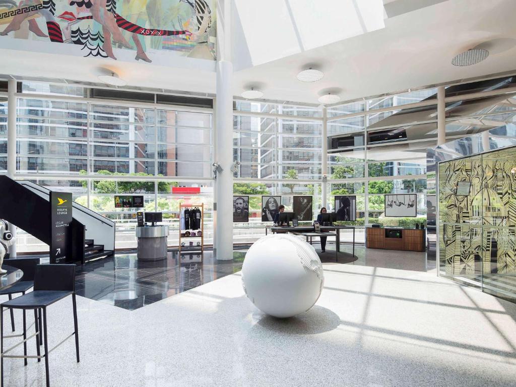 a large room with a large white ball on the floor at Pullman Sao Paulo Vila Olimpia in Sao Paulo