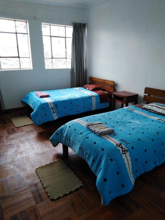 Cama o camas de una habitación en Secret Garden