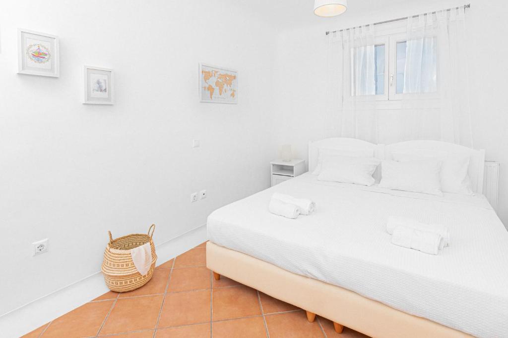 Posteľ alebo postele v izbe v ubytovaní Tranquil Villas by Whitelist Mykonos