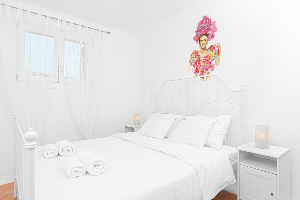 Posteľ alebo postele v izbe v ubytovaní Tranquil Villas by Whitelist Mykonos