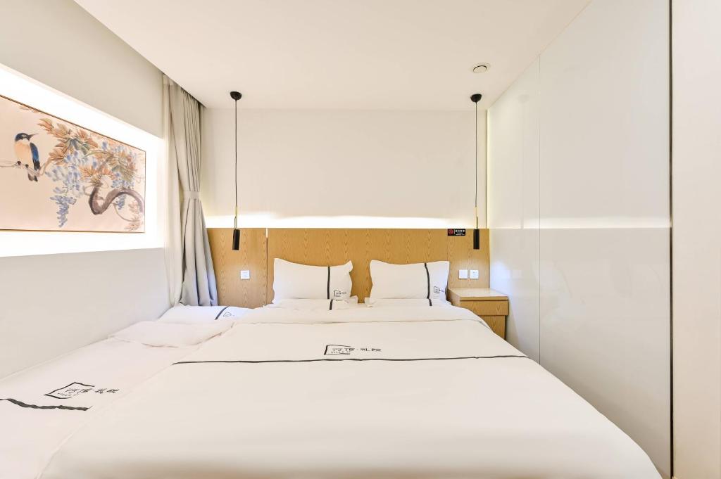 Xingshe Alley Courtyard Hotel Beijing Wangfujing Forbidden City Branch - Li Yuan Deluxe Doppelzimmer