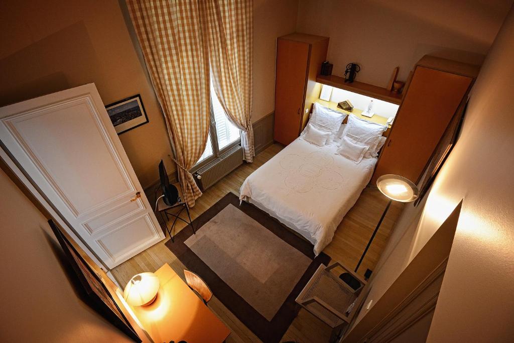 Postel nebo postele na pokoji v ubytování Hotel Le Clos Raymi