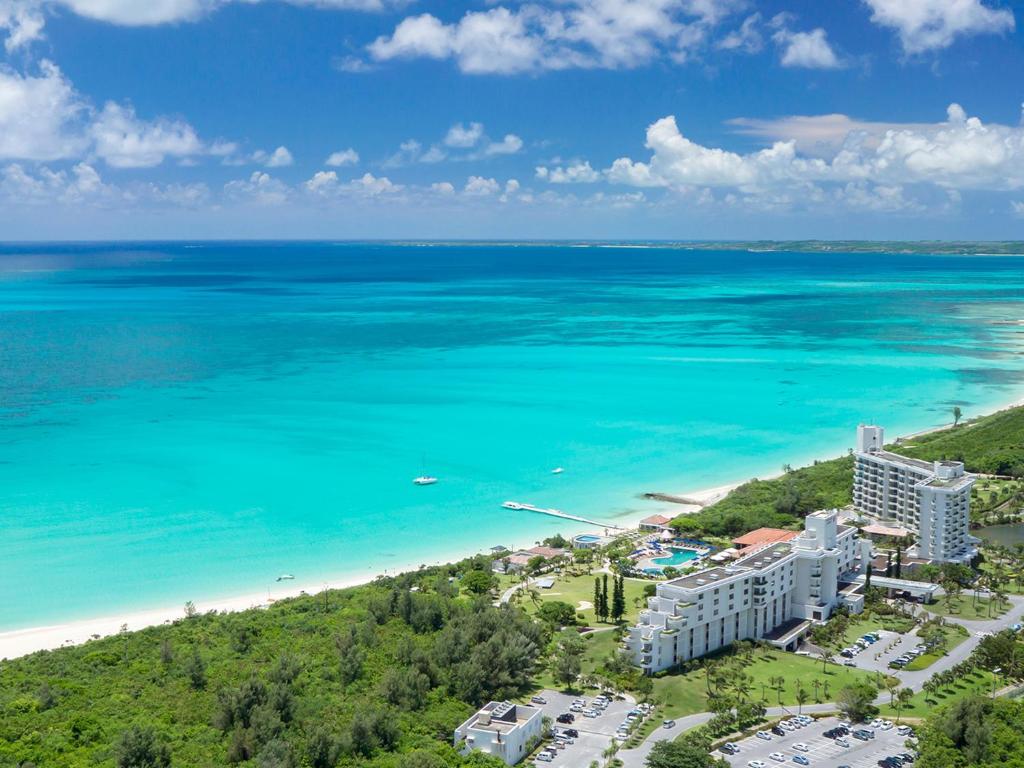 an aerial view of the beach and the ocean at Miyakojima Tokyu Hotel & Resorts in Miyako-jima