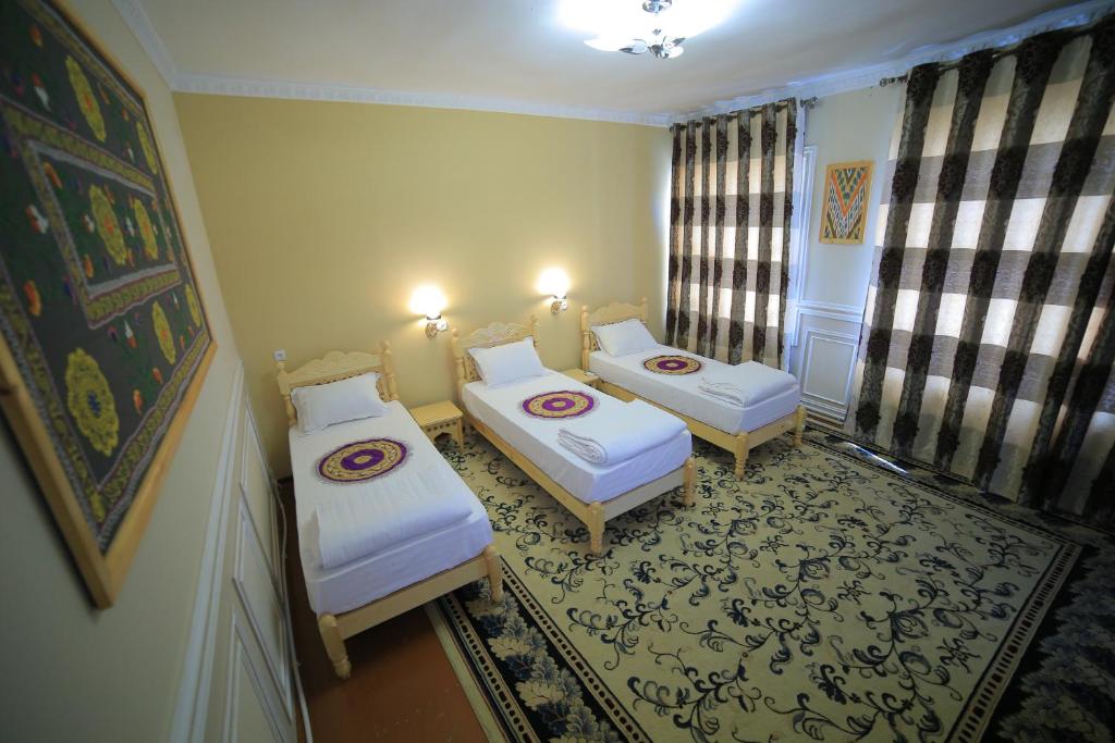 Katil atau katil-katil dalam bilik di Old Street Guesthouse