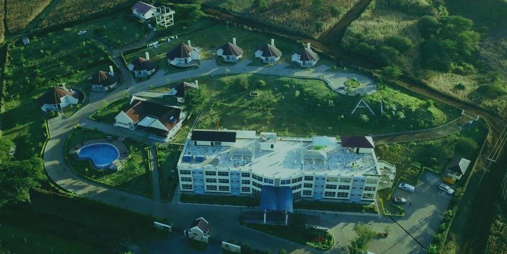 an aerial view of a large white building at A1 Hotel and Resort in Arusha