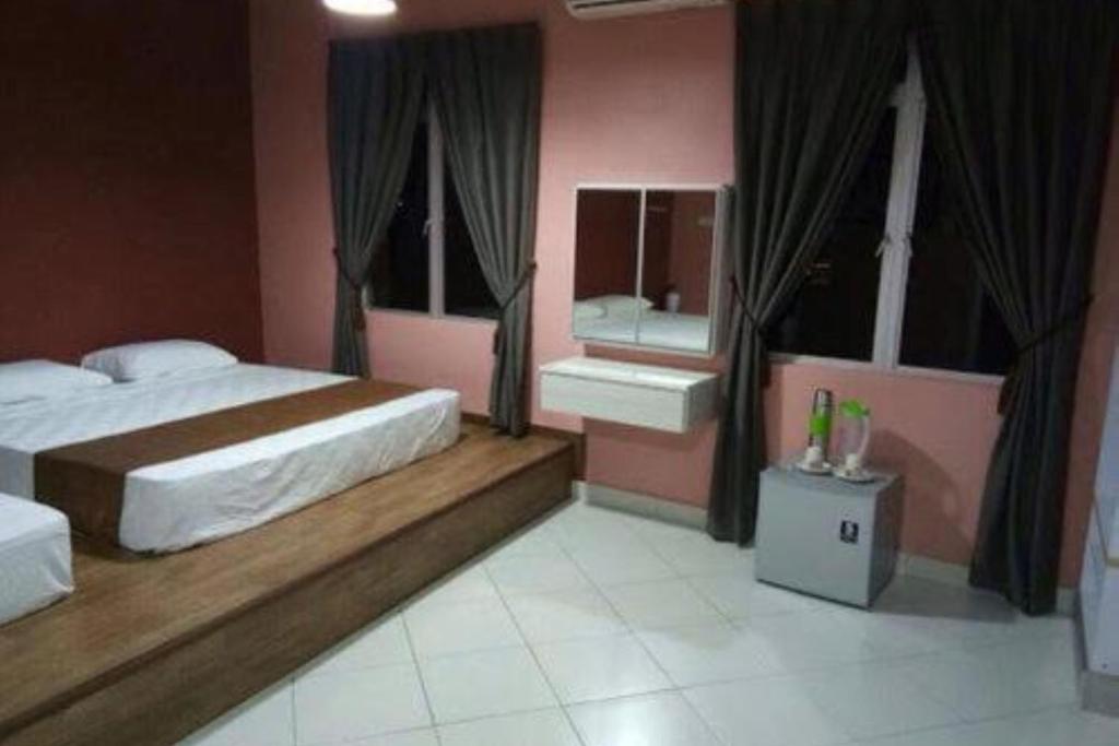 Postel nebo postele na pokoji v ubytování Aeon Tebrau Apartment Johor Bahru - By Room -
