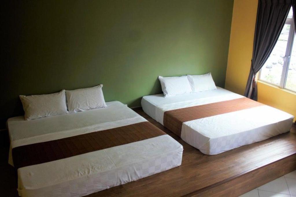 Postel nebo postele na pokoji v ubytování Aeon Tebrau Apartment Johor Bahru - By Room -