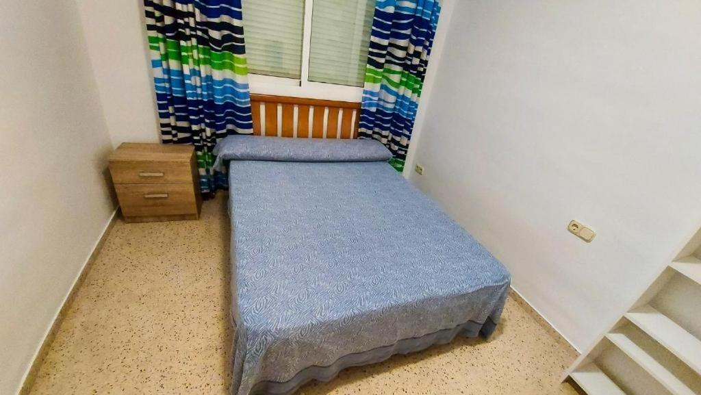 A bed or beds in a room at Room in an apartment