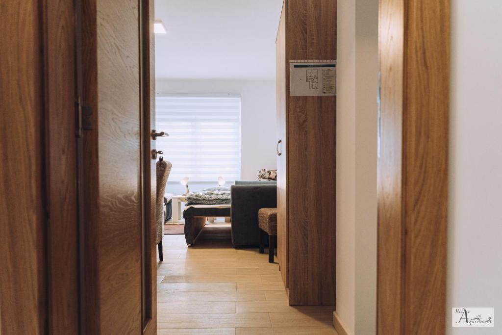 Postel nebo postele na pokoji v ubytování Relax Apartment - Ada