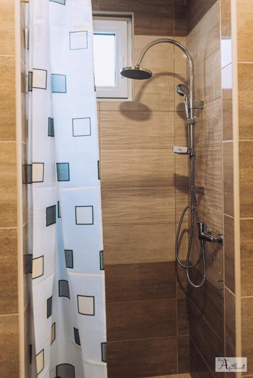 Koupelna v ubytování Relax Apartment - Ada