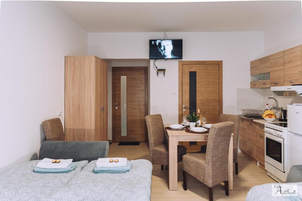 Kuchyň nebo kuchyňský kout v ubytování Relax Apartment - Ada