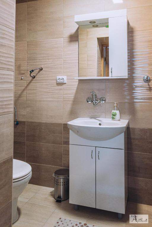 Koupelna v ubytování Relax Apartment - Ada