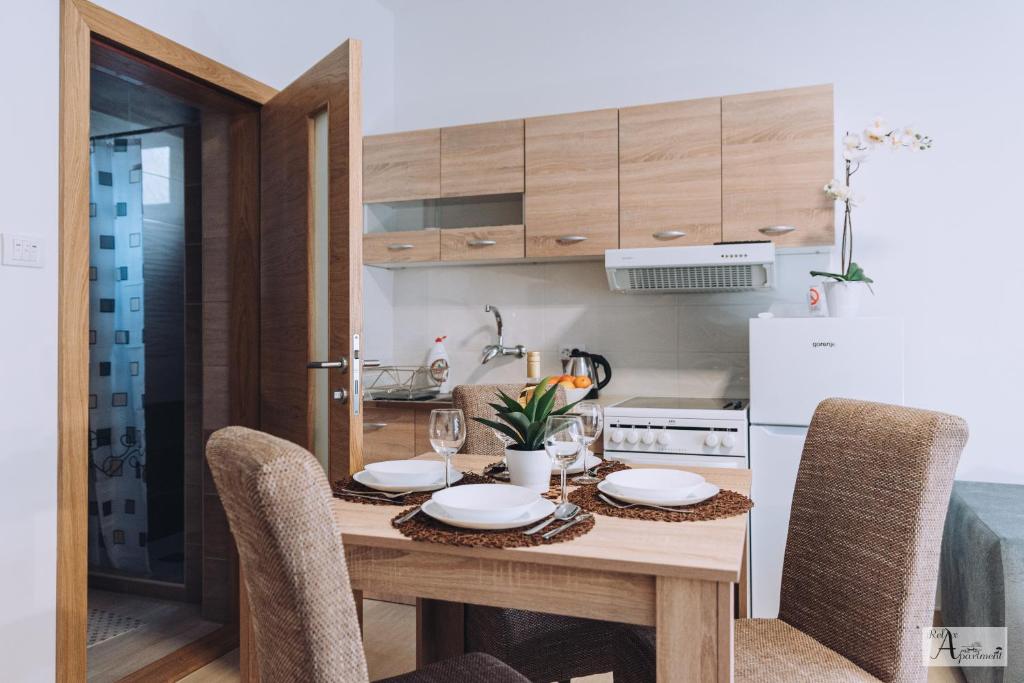 Kuchyň nebo kuchyňský kout v ubytování Relax Apartment - Ada