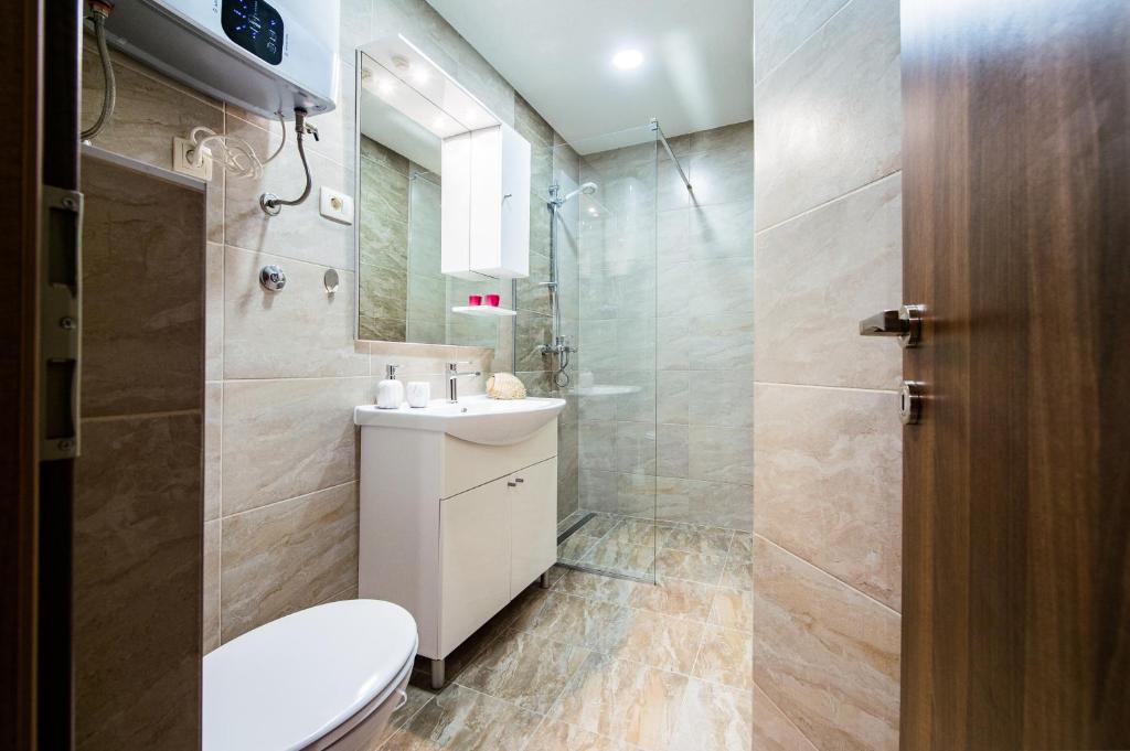 Kúpeľňa v ubytovaní Beach Apartment Val