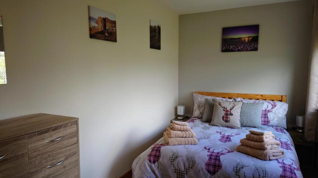 Postel nebo postele na pokoji v ubytování Uig Chalets Idrigill Hill Chalet
