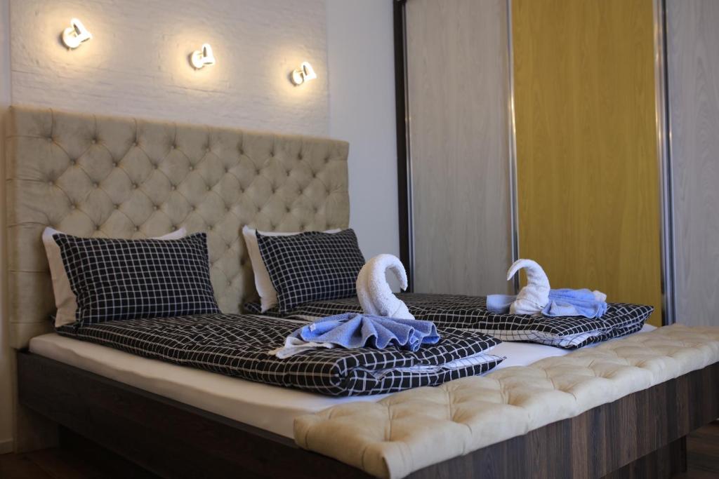 Postel nebo postele na pokoji v ubytování Bella apartments