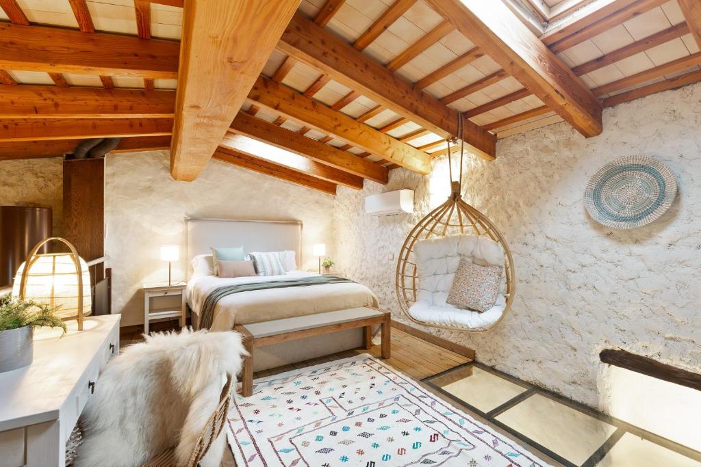 Säng eller sängar i ett rum på El Pajar del Emporda - Costa Brava