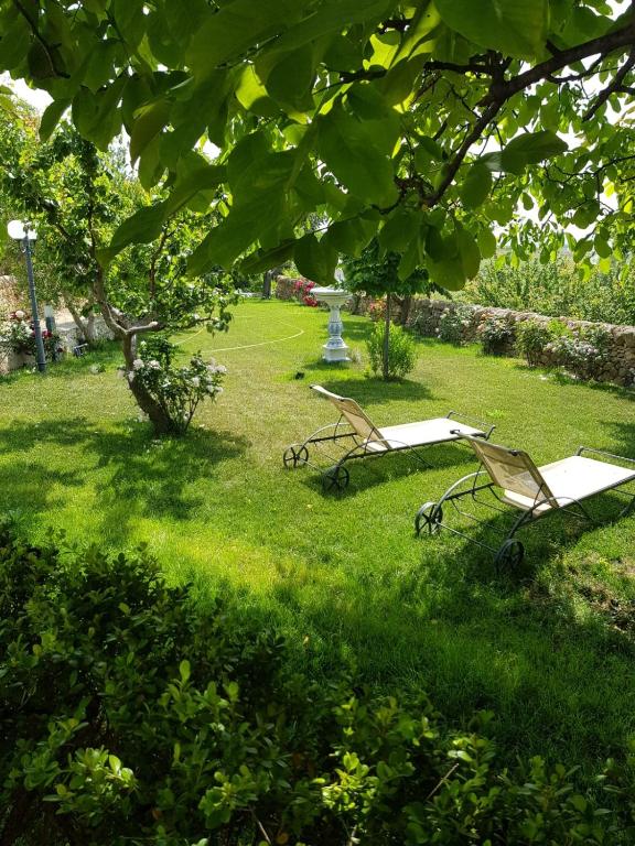 Vonkajšia záhrada v ubytovaní SCUDERIE DEL CAVALIERE delle GRAVINE
