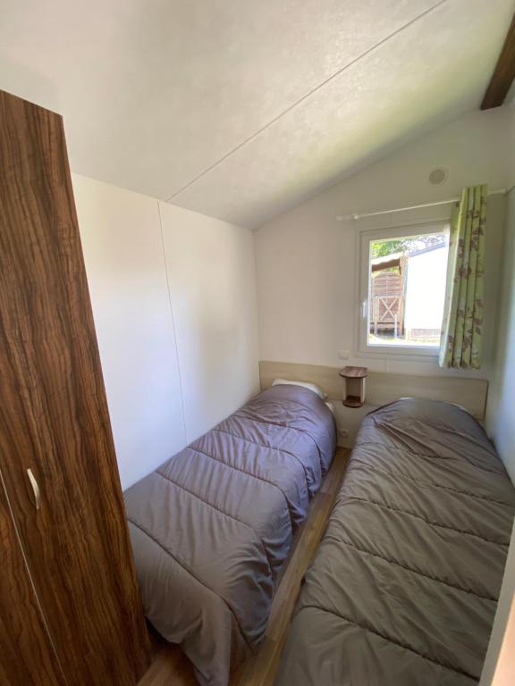 Letto o letti in una camera di Domaine Les Abberts