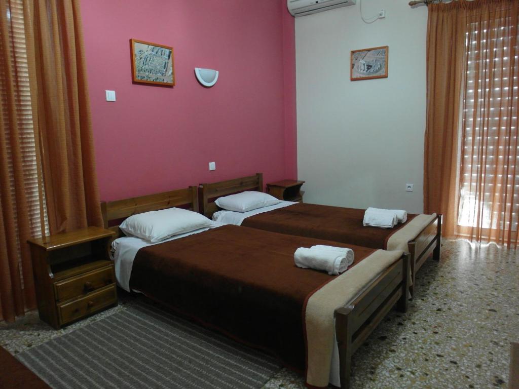 Voodi või voodid majutusasutuse Hotel Alexandrion toas