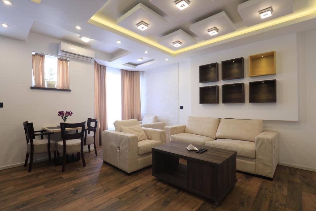 Posezení v ubytování Bella apartments