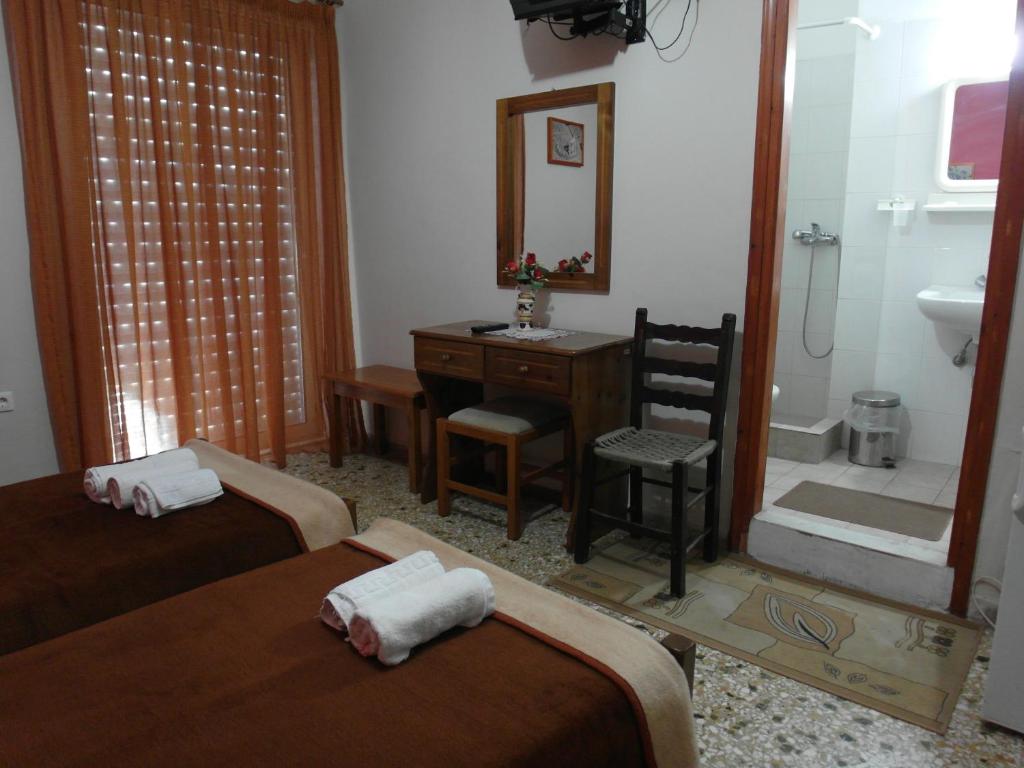 Voodi või voodid majutusasutuse Hotel Alexandrion toas