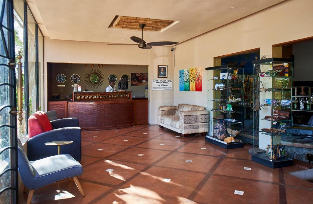 Kuchyň nebo kuchyňský kout v ubytování Catembe Gallery Hotel