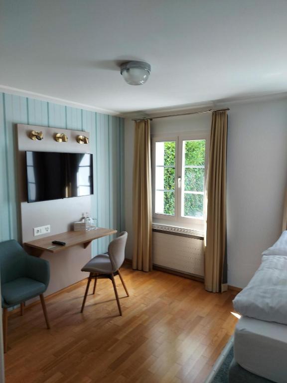 Postel nebo postele na pokoji v ubytování Hotel Kreuz by b-smart
