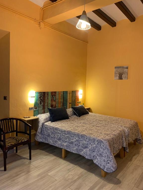 Cama o camas de una habitación en Hotel rural La soleia d'Oix