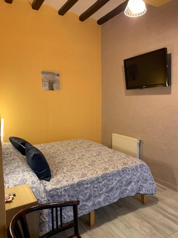 Cama o camas de una habitación en Hotel rural La soleia d'Oix