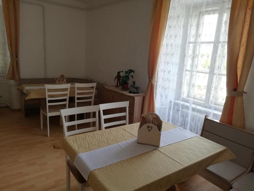 A seating area at Arany Bárány Vendégfogadó