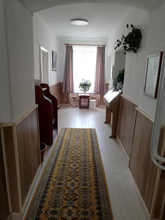 A seating area at Arany Bárány Vendégfogadó