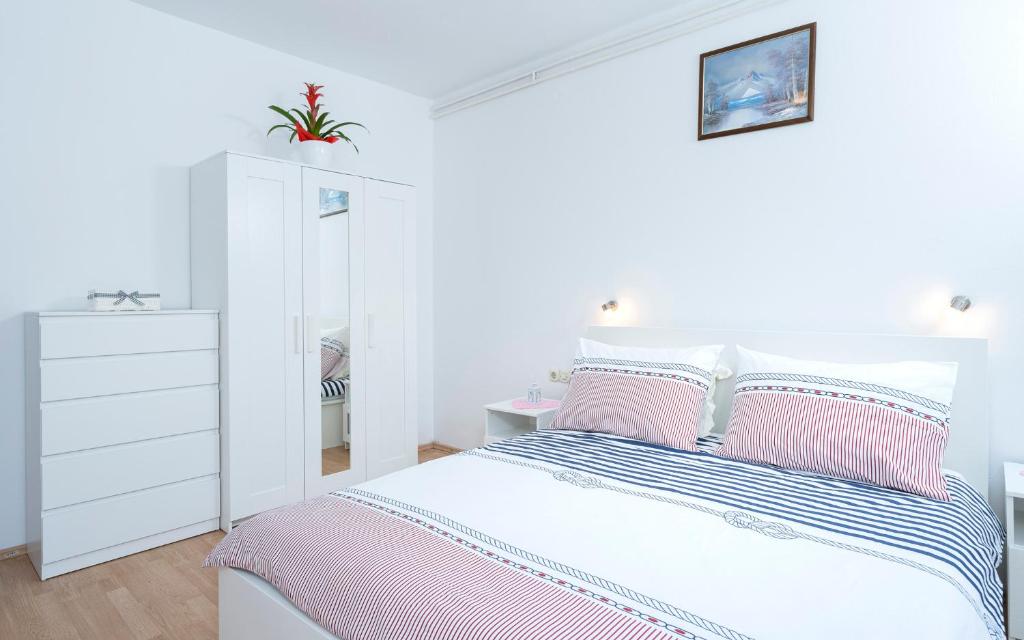 Posteľ alebo postele v izbe v ubytovaní Apartments Draganic
